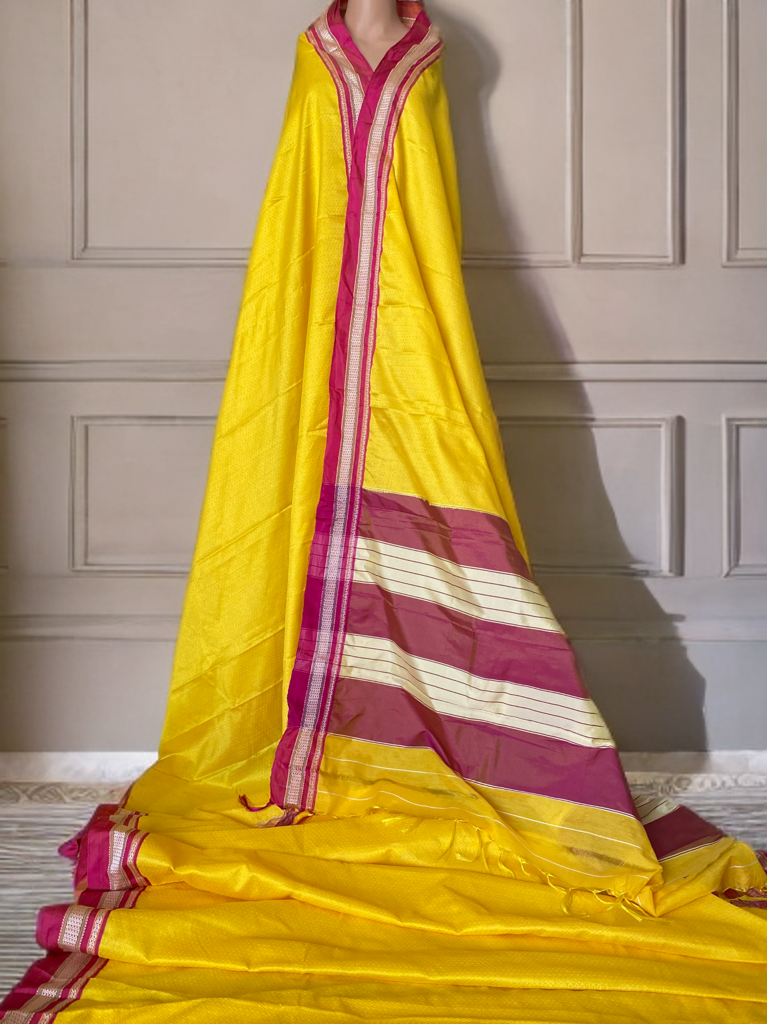 Yellow saree with Pink border